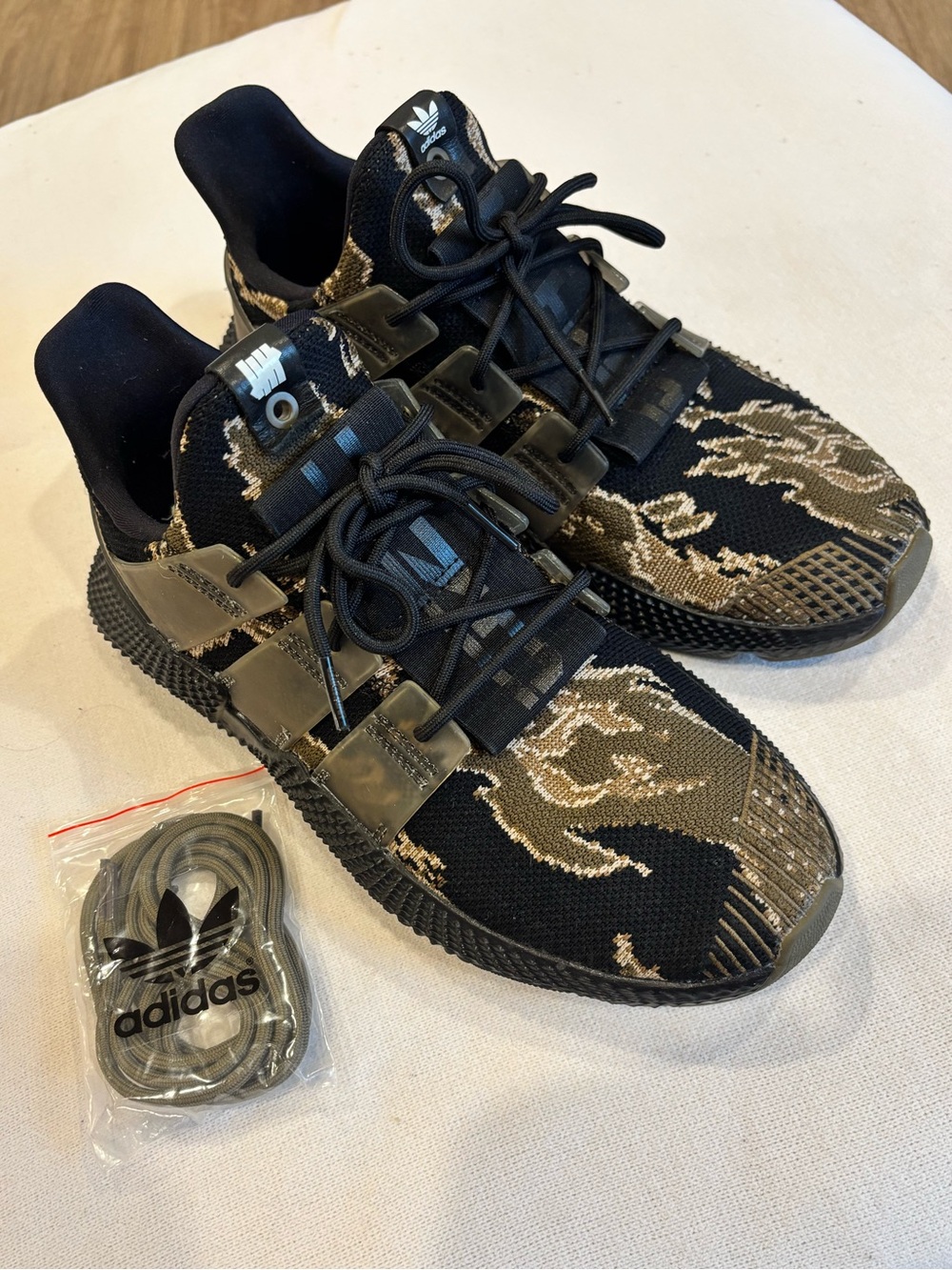 Adidas x Undefeated shoes, men’s 9